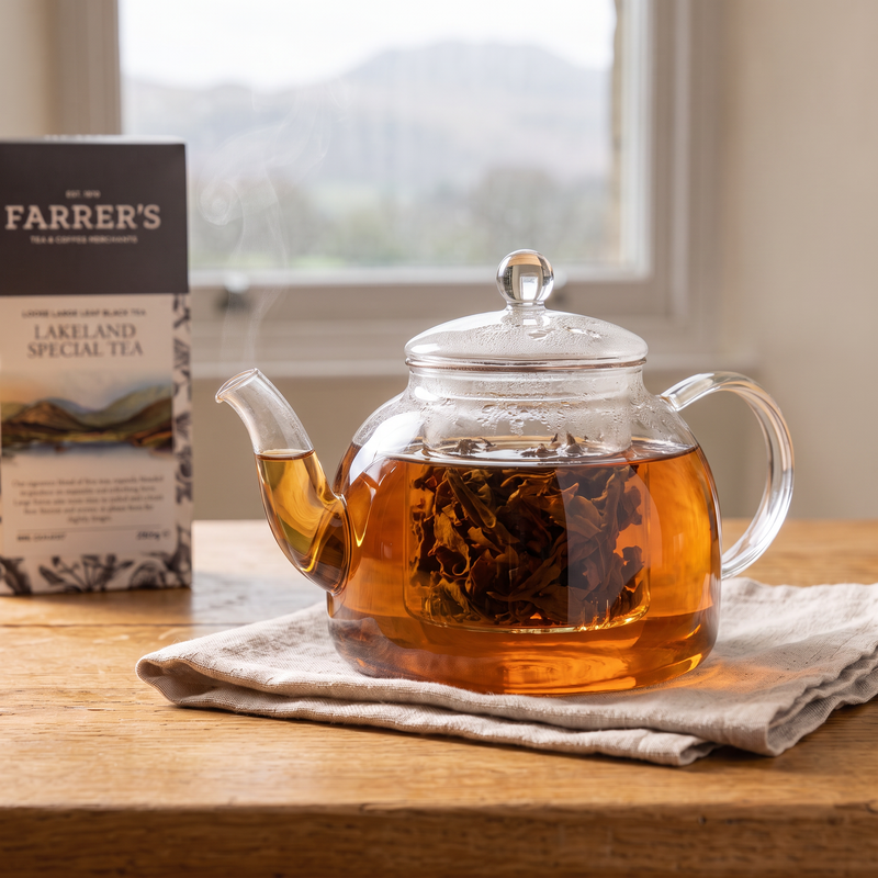 Lakeland Special loose-leaf tea steeping to a deep amber colour in a clear glass teapot