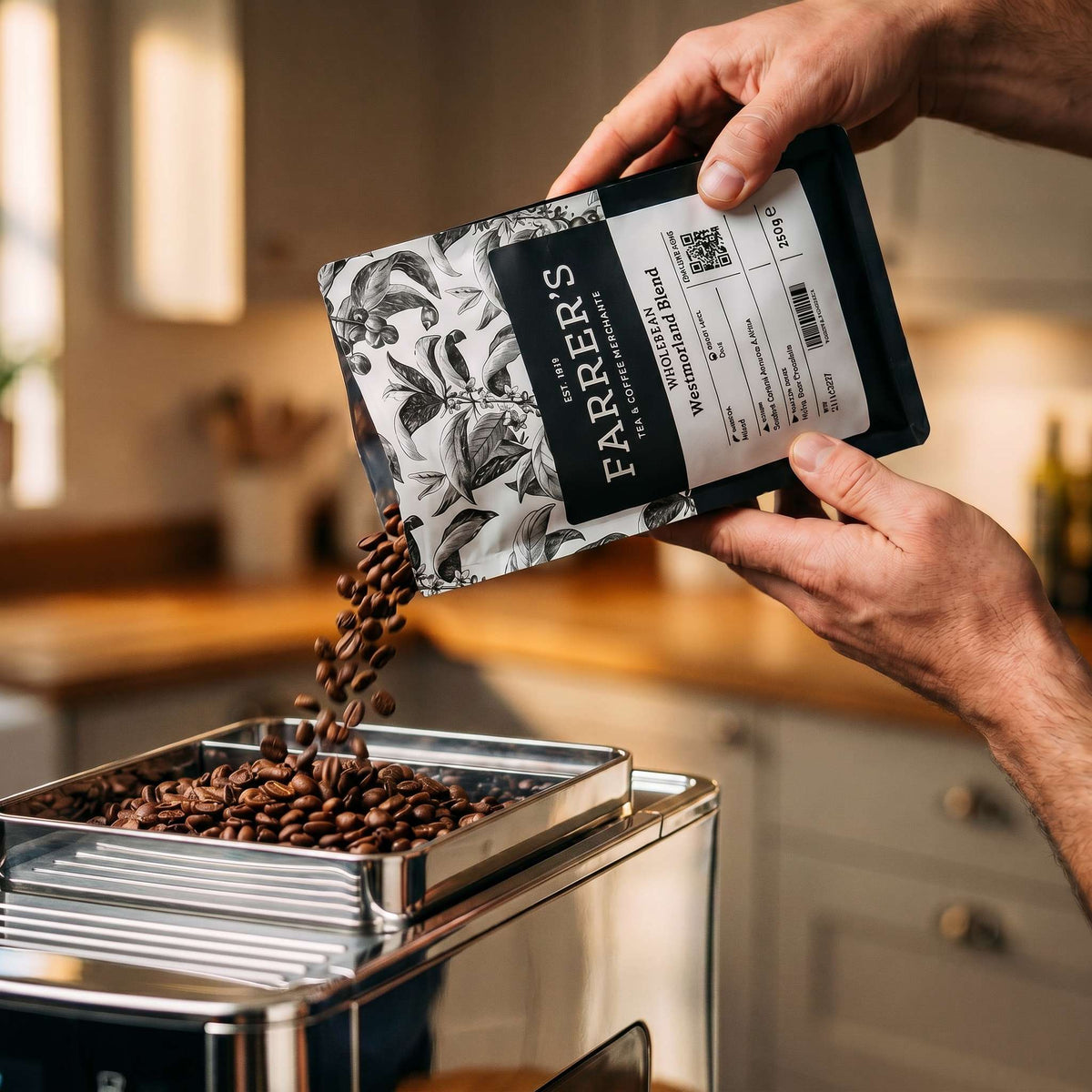 Filling a coffee grinder with Farrer's beans